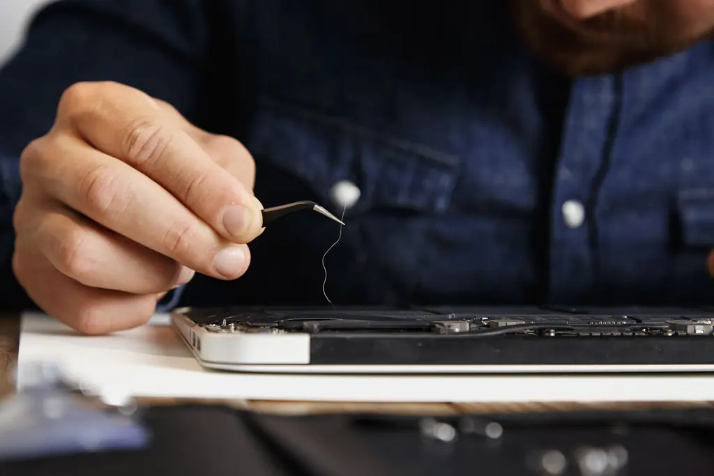 Cleaning a laptop cooling fan